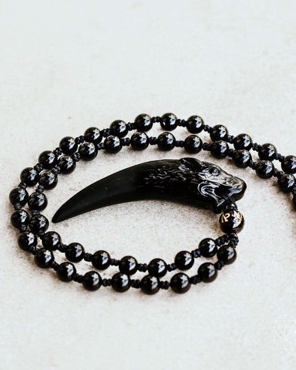 The Obsidian Wolf Pendant
