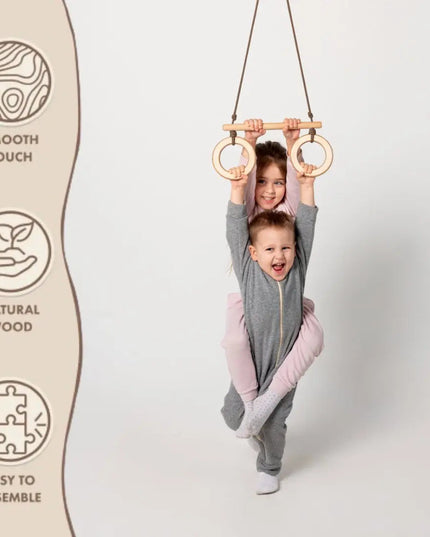 Trapeze swing bar with rings